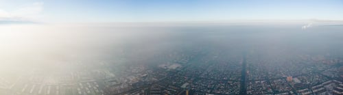 Preview: Panoramic aerial view of polluted city covered with smog