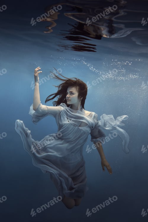 Preview: Portrait Of A Girl In A Blue Dress Under Water