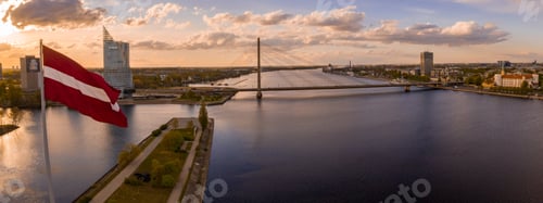 Preview: Aerial panoramic shot of Latvia's flag on Riga's cityscape background