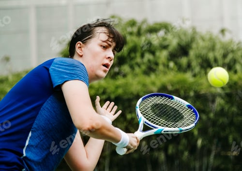 Preview: Player trying to hit the tennis ball