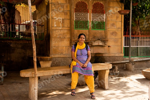 Preview: Woman tourist at golden fort Jaisalmer, India.