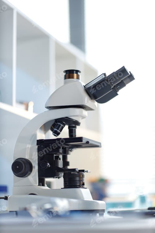 Preview: Laboratory Microscope Standing on Table in Bright Scientific Research Setting
