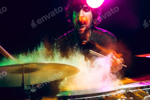 Preview: Drummer's rehearsing on drums before rock concert. Man recording music on drumset in studio