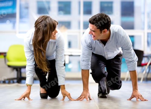 Preview: Competitive Business Couple Ready For A Race At The Office