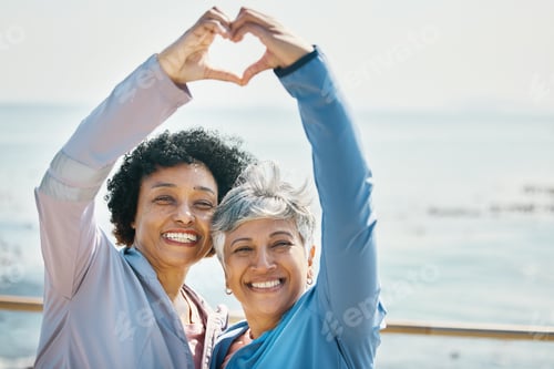 Preview: Heart, hands and health with portrait of friends at beach for fitness, support and love. Motivation