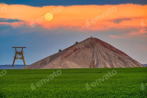 Preview: a view of an overburden heap in saxony-anhalt with a winding tower