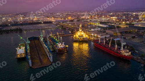 Preview: Dry dock or Floating dock Shipyard at night for repare and maintenance cargo container ship service