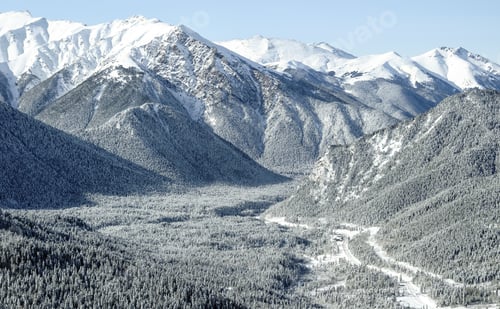 Preview: Snow-covered mountain valley