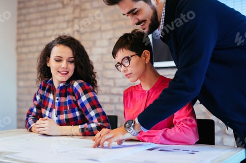Preview: Picture of young architects discussing in office