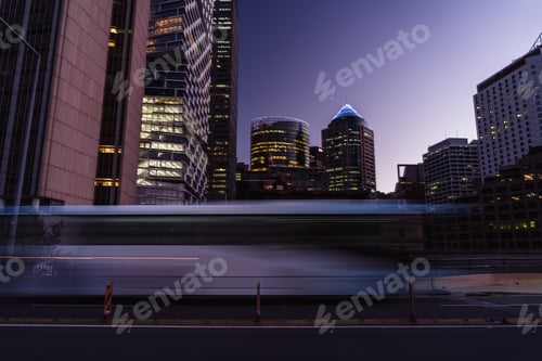 Preview: fast moving bus in motion at night in the city, light trails