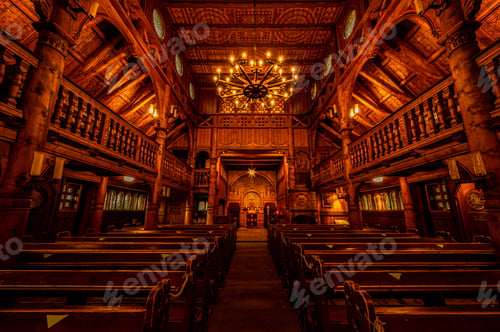Preview: Row of chairs with chandelier inside a church