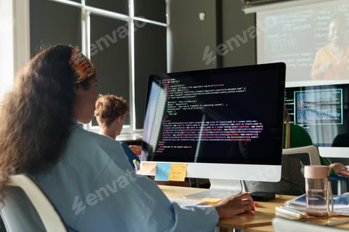 Preview: Schoolgirl working with computer codes