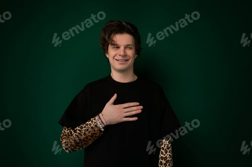 Preview: Man in Black Shirt Posing for Picture