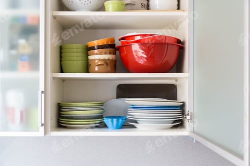 Preview: Shelf with plates, bowls and cups at home