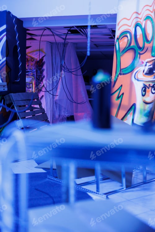 Preview: Graffiti drawings glowing under blue neon lights