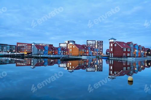 Preview: colorful buildings on water at marina Reitdiephaven