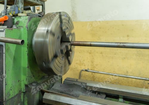 Preview: Metal is rotating around big drill of steel metal lathe machine engine, manufacturer in industry