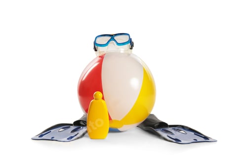 Preview: Beach ball, sunblock lotion and swimming equipment on white background