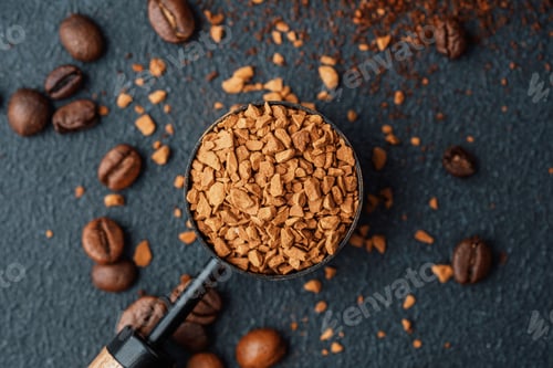 Preview: Instant coffee granules in scoop with coffee beans