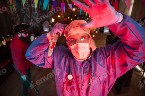 Preview: Halloween party with men dressed up like scary monsters