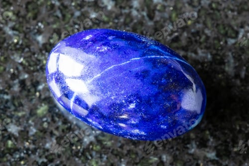 Preview: sample of polished lapis lazuli mineral on black