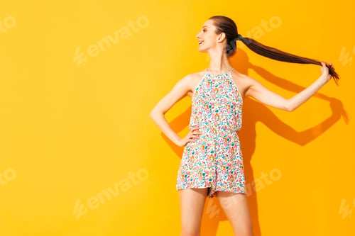 Preview: Young beautiful funny woman posing in studio