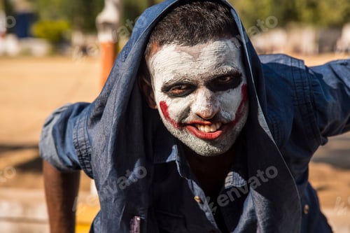 Preview: Close-up portrait of a horrible scary zombie man. Horror. Halloween.