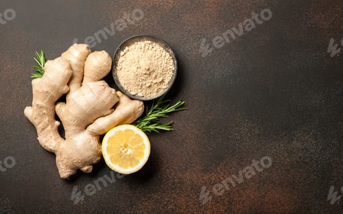 Preview: Ginger root, ginger powder and lemon on vintage background