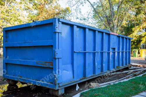 Preview: Loaded dumpster near a construction site