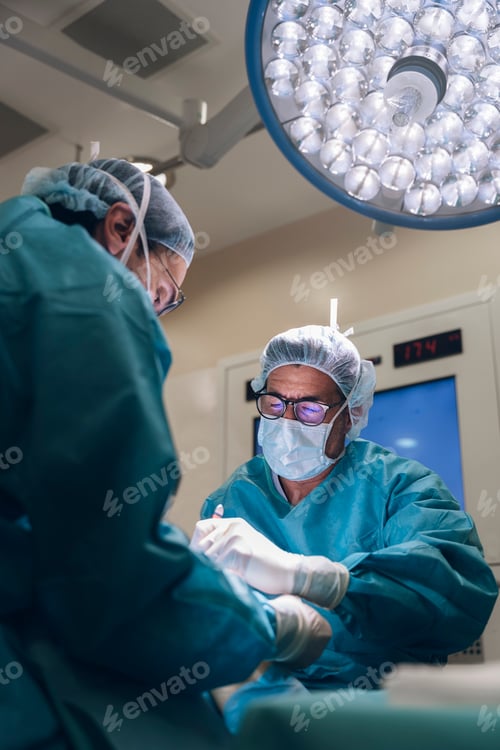 Preview: Surgeons doing surgery in hospital