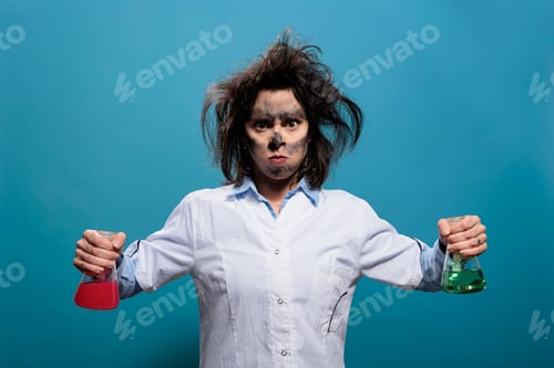 Preview: Mad and enranged scientist with wacky look infuriated by failed chemical experiment.