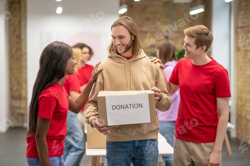 Preview: Workers of the non profit organization distributing donations