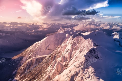Preview: Aerial landscape view of the snow covered mountain range