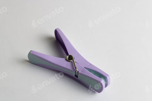 Preview: Single clothespin isolated on a white background