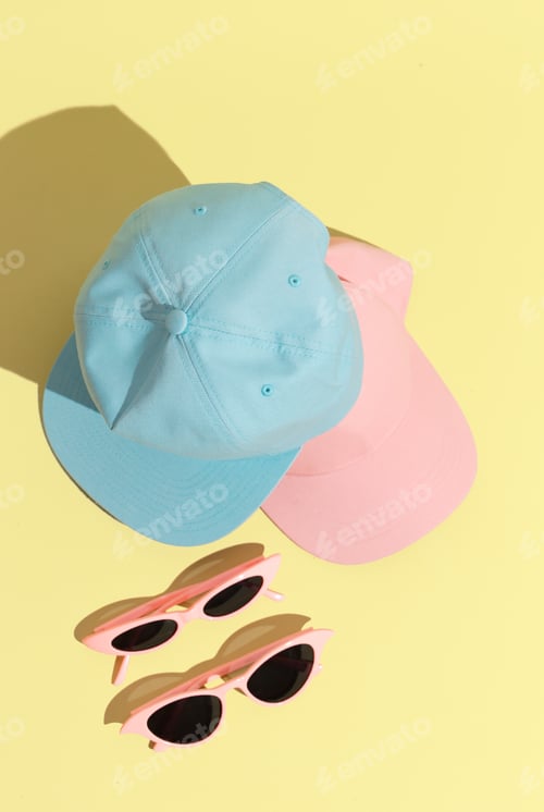 Stylish summer accessories cap and sunglasses. Fashion still life concept