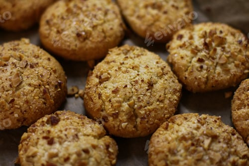 Preview: nut homemade cookies with almonds. Delicious sweet snack. food background, cookie texture close-up.