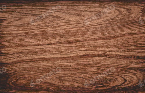 Vista previa: Brown scratched wooden cutting board, flat lay.