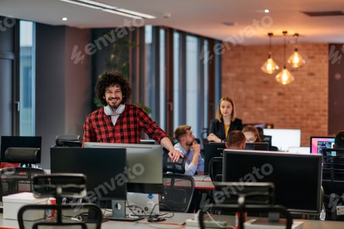 Preview: Strategic Business Meeting: Group of Professionals Collaborating in Office Using Computers
