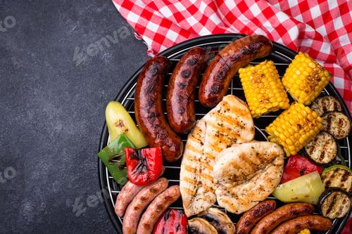 Preview: Grilled sausages, meat, and vegetables