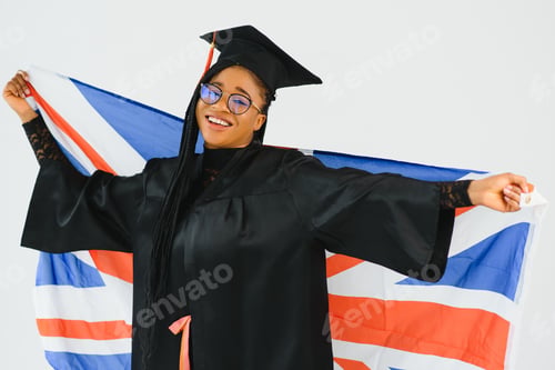 Preview: Beautiful African-American girl with flag of Great Britain as background. Learning English