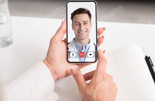 Preview: Lady Talking With Doctor Via Video Call On Phone Indoors