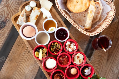 Preview: Delicious traditional turkish breakfast with turkish tea on the wooden table.