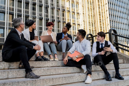 Preview: Inclusive Corporate Meeting: Diverse Team Collaborating on Steps