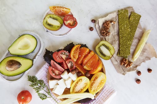 Preview: Seasonal salad with tomatoes, basil, dill, feta cheese, sesame. Superfood snacks with spirulina