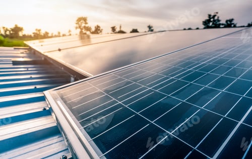 Preview: Selective focus on solar panel or photovoltaic module with sunset sky. Solar power for green energy.
