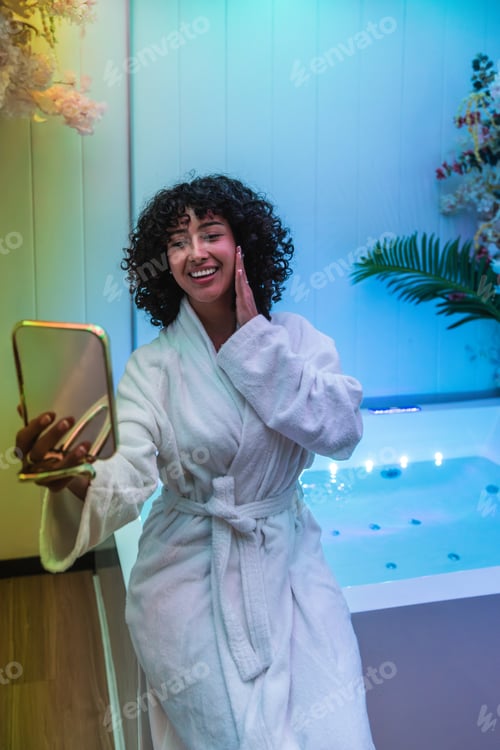 Preview: Young woman enjoying spa relaxation and beauty treatment