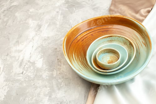 Preview: front view brown plate with smaller plates on light surface kitchen food ladies meal horizontal