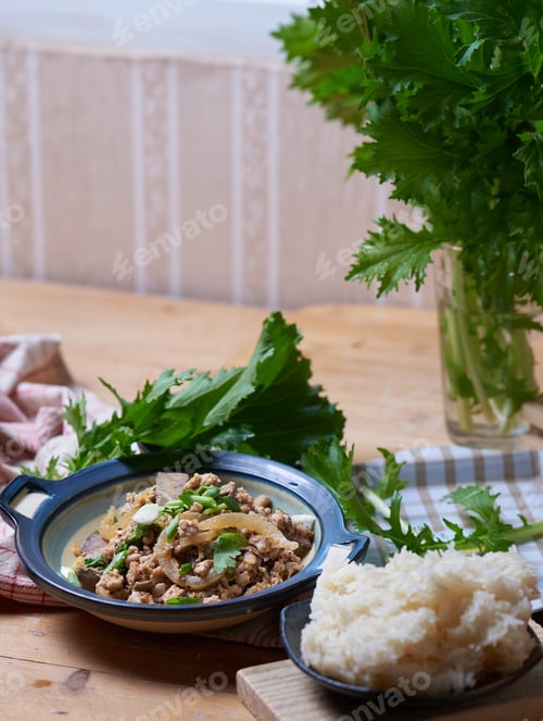 Preview: Lao pork salad with rice and vegetable
