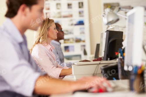 Preview: Workers At Desks In Busy Creative Office