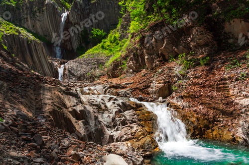 Preview: Beautiful waterfall in the mountains